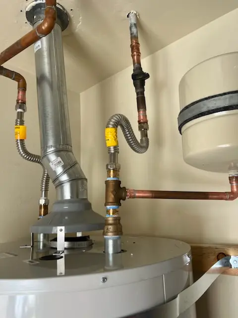 Water heater installation and plumbing repair in North Village